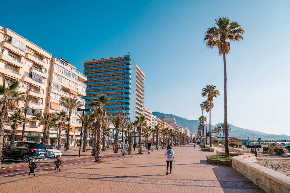 The seafront promenade in Fuengirola with apartment blocks and palm trees
